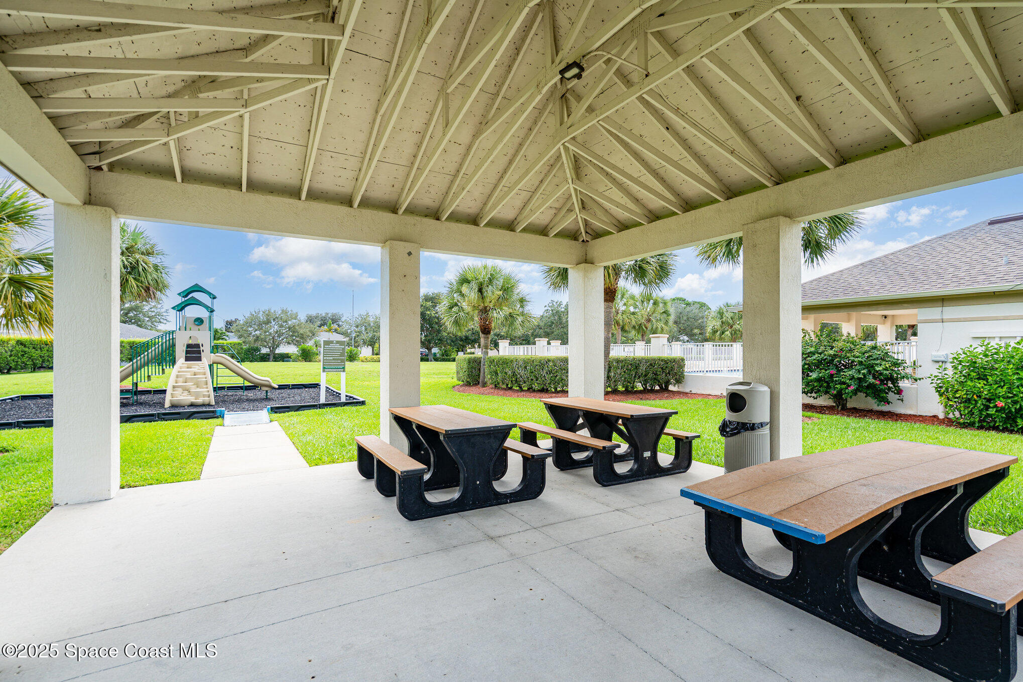 1162 Brumpton Place Rockledge, FL 32955 - Photo 24 of 25 a swimming pool with outdoor seating and yard