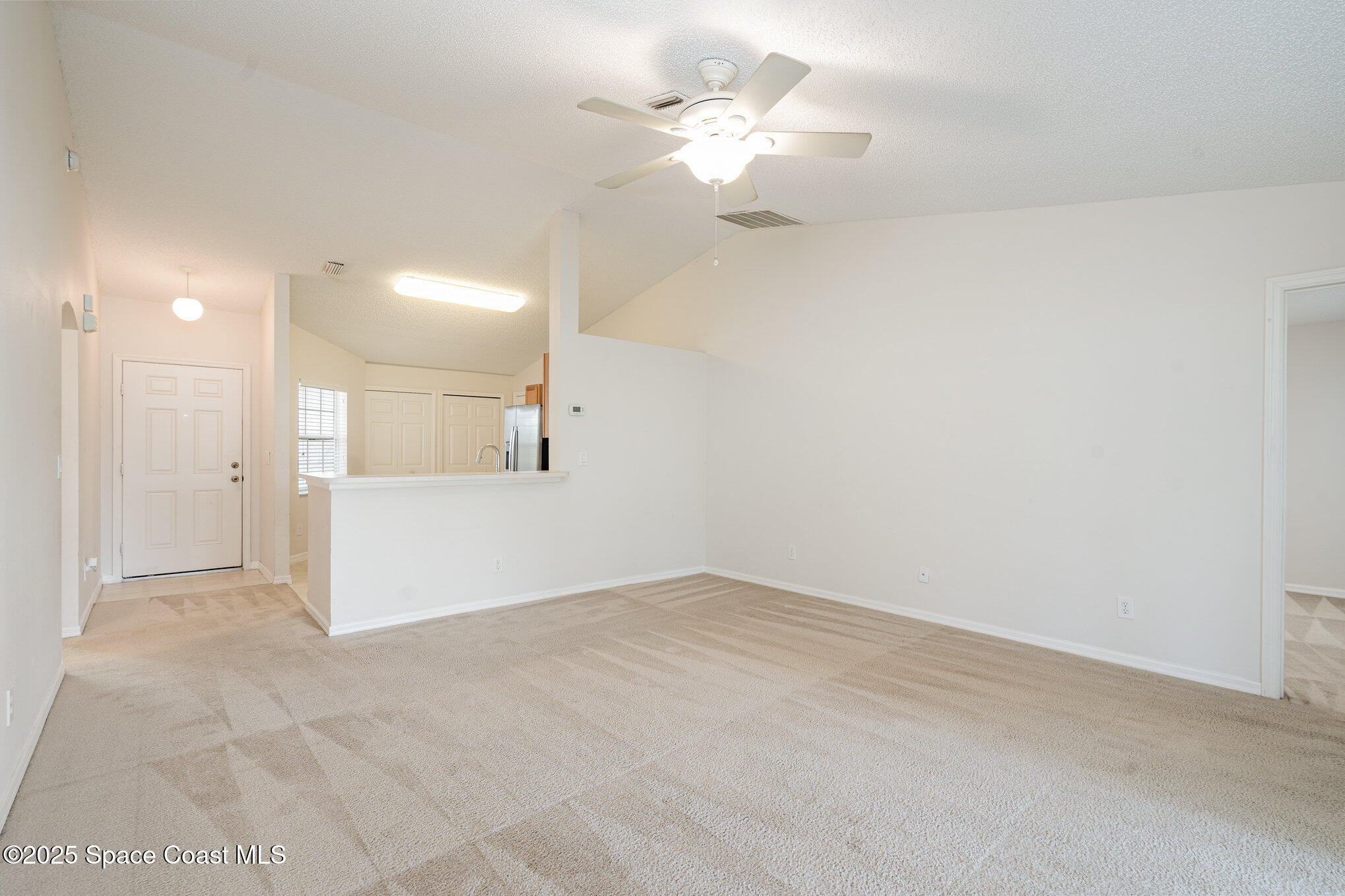 1162 Brumpton Place Rockledge, FL 32955 - Photo 8 of 25 a view of a livingroom with a sink