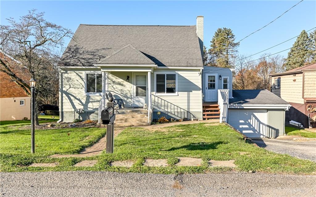 1711 Mercer Street Aliquippa, PA 15001 - Photo 1 of 27 a view of a house with a yard