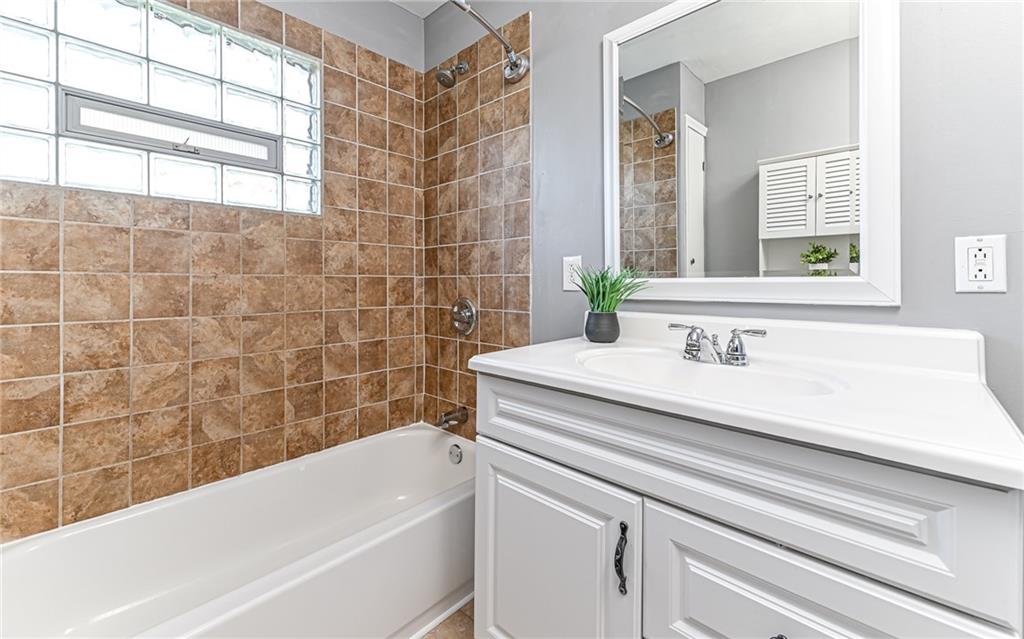 1711 Mercer Street Aliquippa, PA 15001 - Photo 12 of 27 a bathroom with a sink and a bathtub