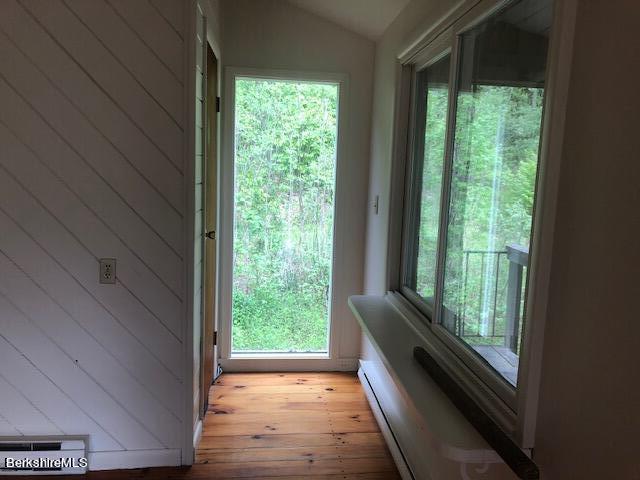 14 Sandisfield Road Sandisfield, MA 01255 - Photo 14 of 26 a view of a room with wooden floor and a window