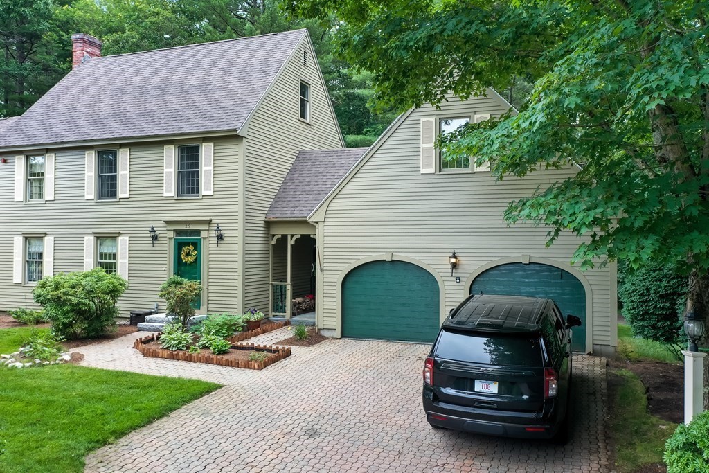 29 Lexington Drive, Unit 29 Atkinson, NH 03811 - Photo 2 of 31 a house view with a garden space