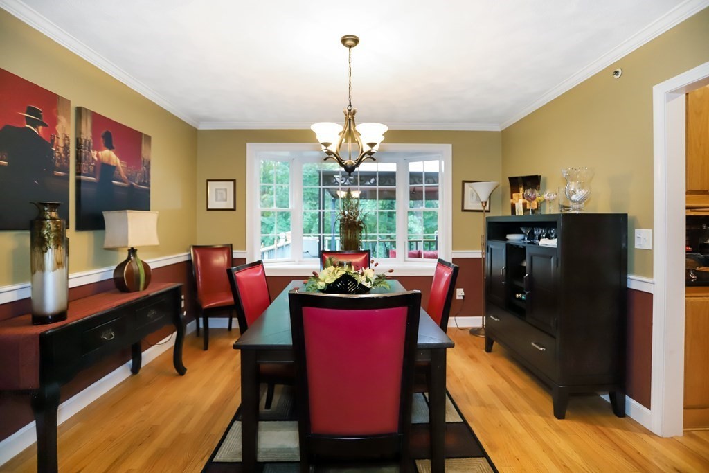 29 Lexington Drive, Unit 29 Atkinson, NH 03811 - Photo 9 of 31 a dining room with furniture and window