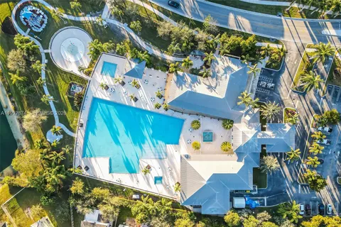 a lobby with furniture and floor to ceiling window