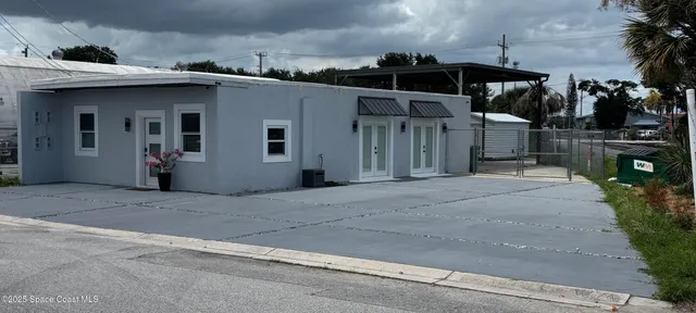 a view of a house with a patio