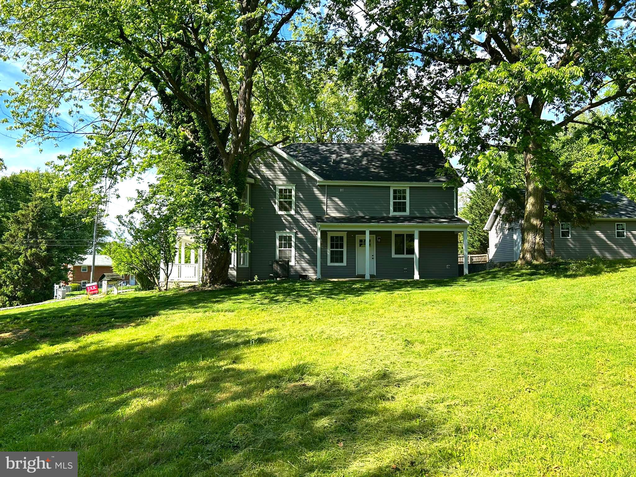 50 St Paul Street Boonsboro, MD 21713 - Photo 2 of 39 a front view of a house with a garden