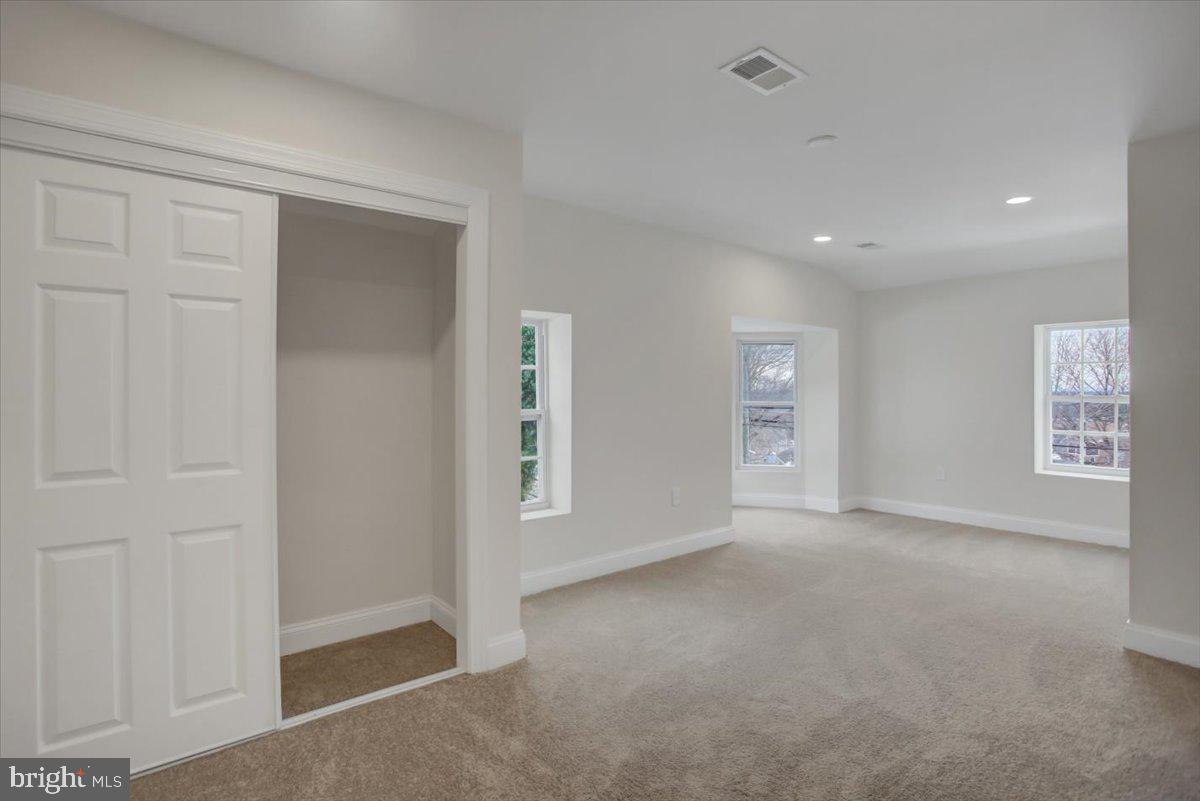 50 St Paul Street Boonsboro, MD 21713 - Photo 25 of 39 an empty room with windows and closet