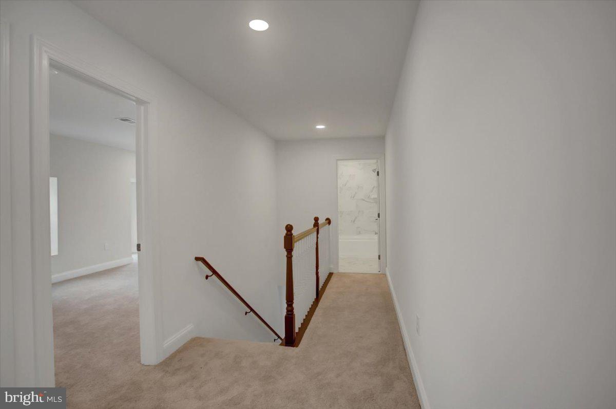 50 St Paul Street Boonsboro, MD 21713 - Photo 41 of 81 a view of a hallway with a white door
