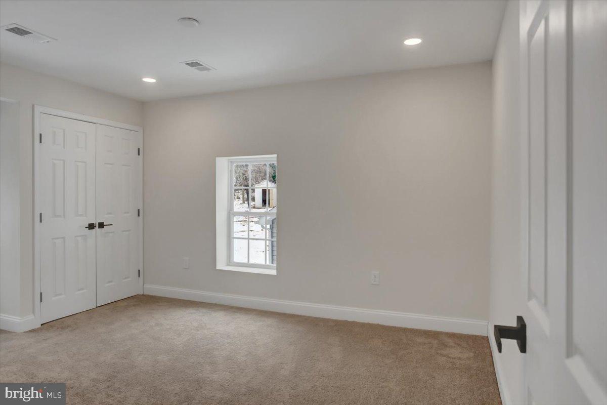 50 St Paul Street Boonsboro, MD 21713 - Photo 59 of 81 an empty room with windows