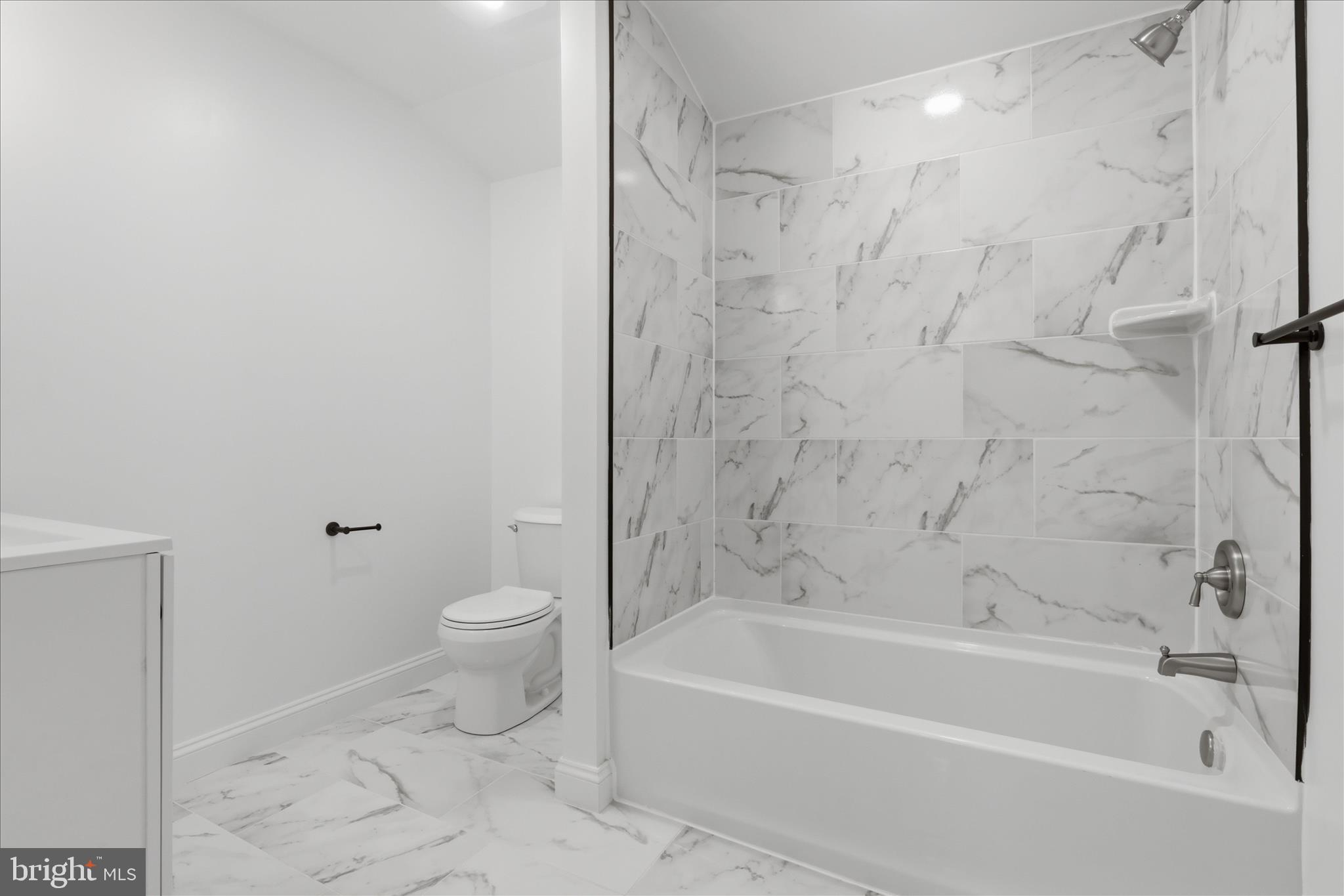 50 St Paul Street Boonsboro, MD 21713 - Photo 60 of 81 a bathroom with a bathtub and a toilet