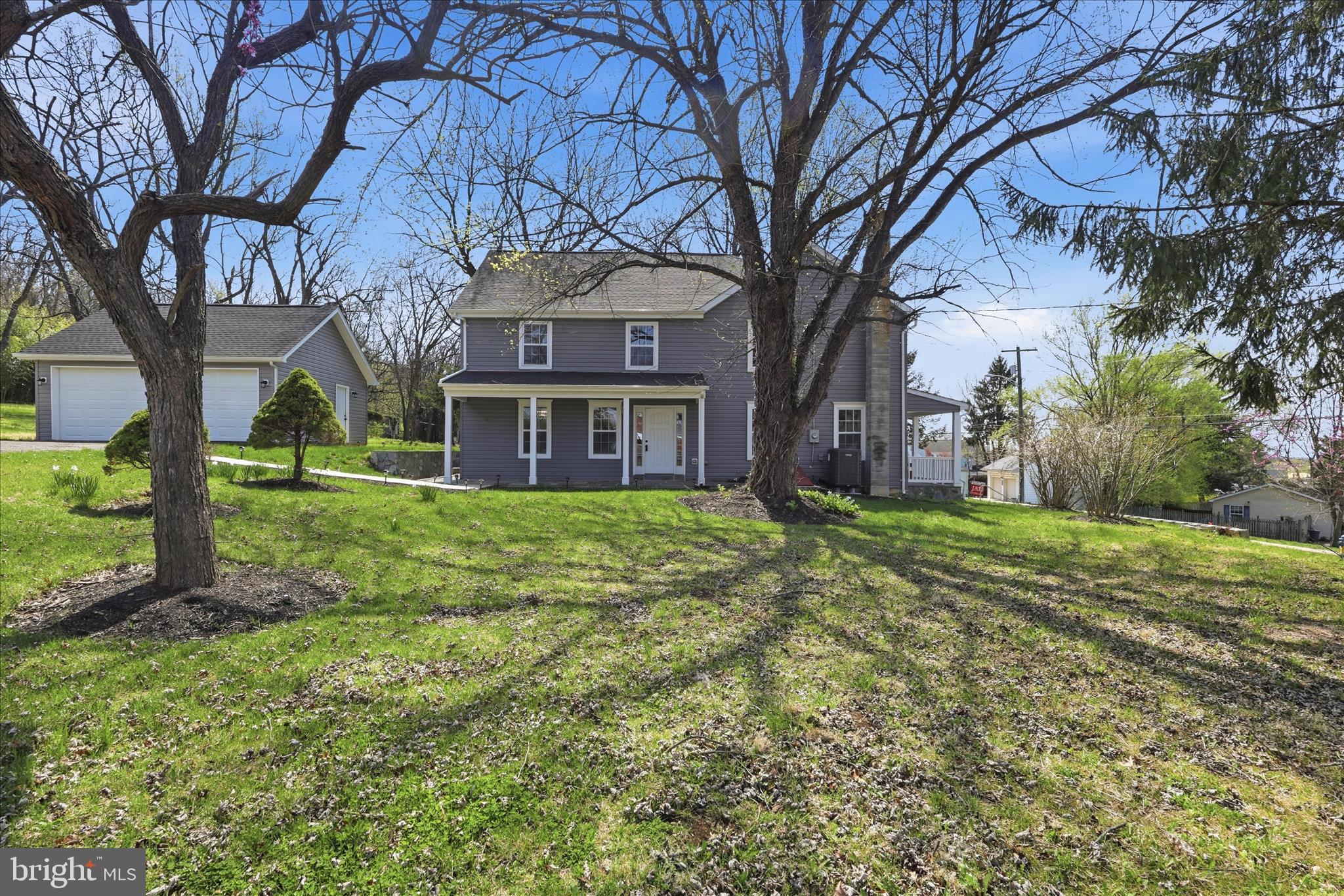 50 St Paul Street Boonsboro, MD 21713 - Photo 7 of 81 a brick house with trees in front of it