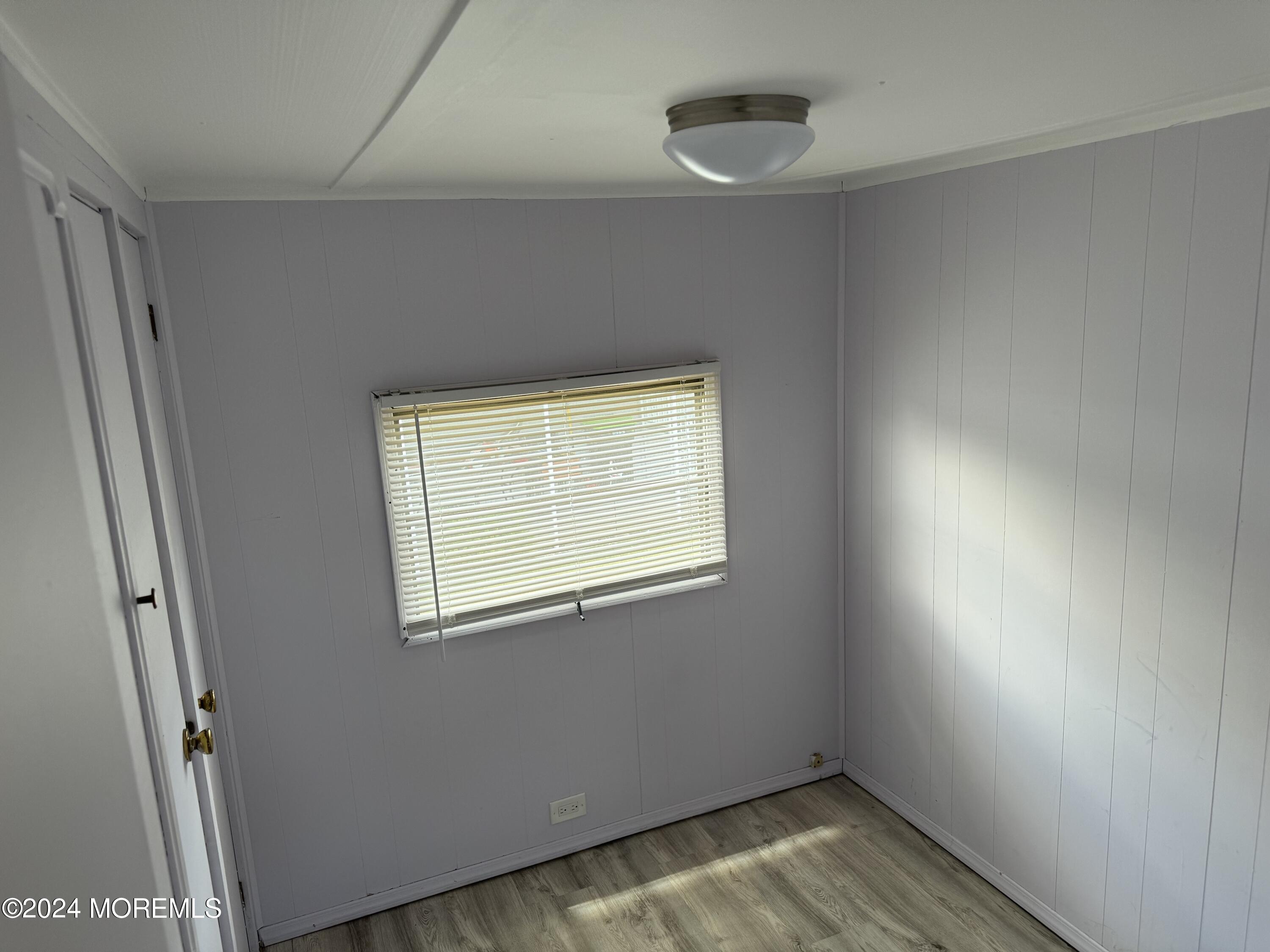 127 Lane B Hazlet, NJ 07730 - Photo 3 of 6 an empty room with a window