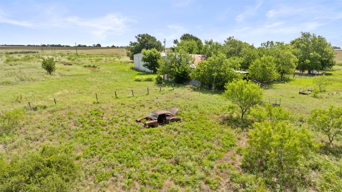 14101 Manda Road Manor, TX 78653 - Photo 13 of 16 a view of a lake with a building in the background