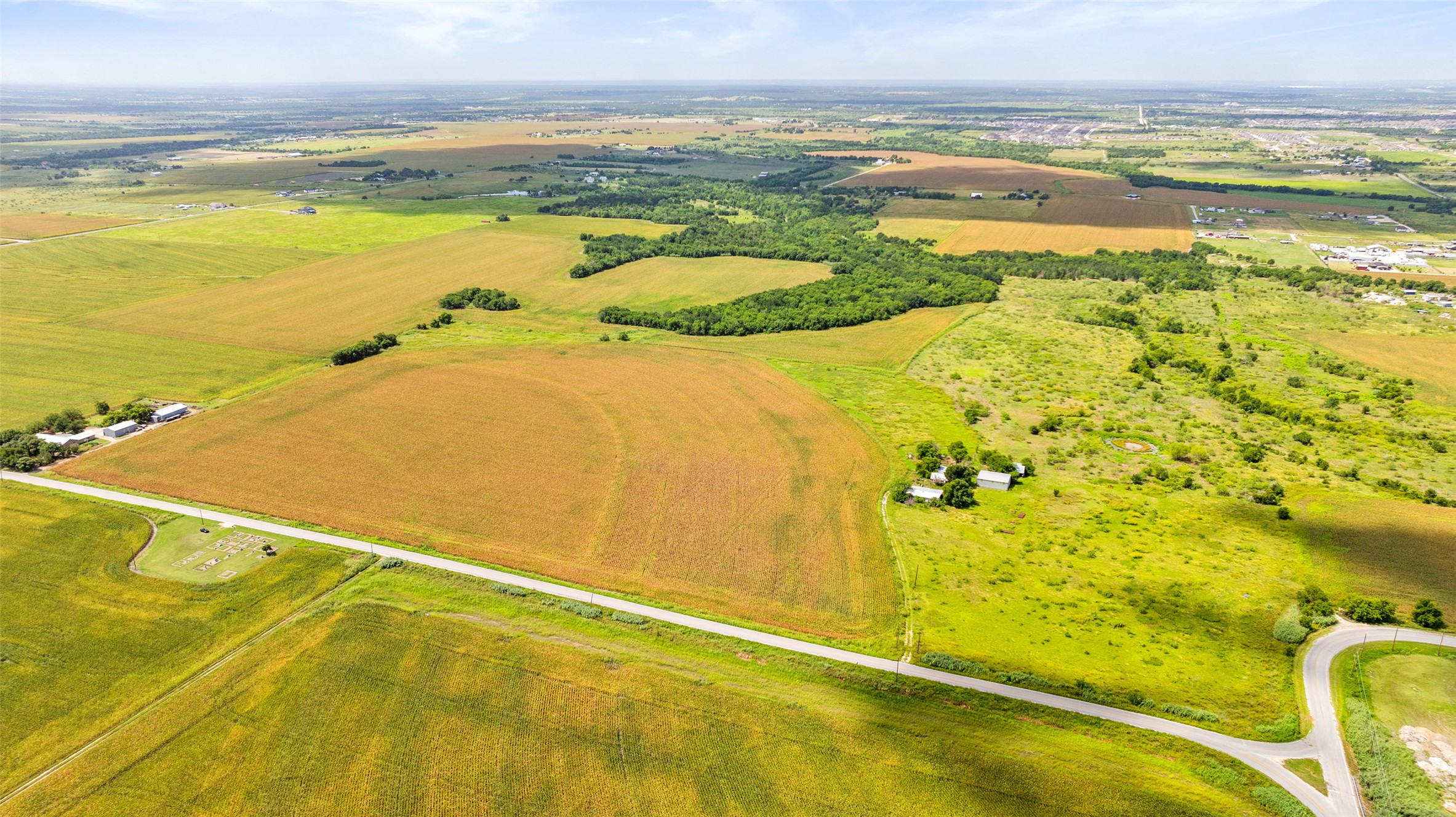 14101 Manda Road Manor, TX 78653 - Photo 2 of 16 a view of an ocean and a houses