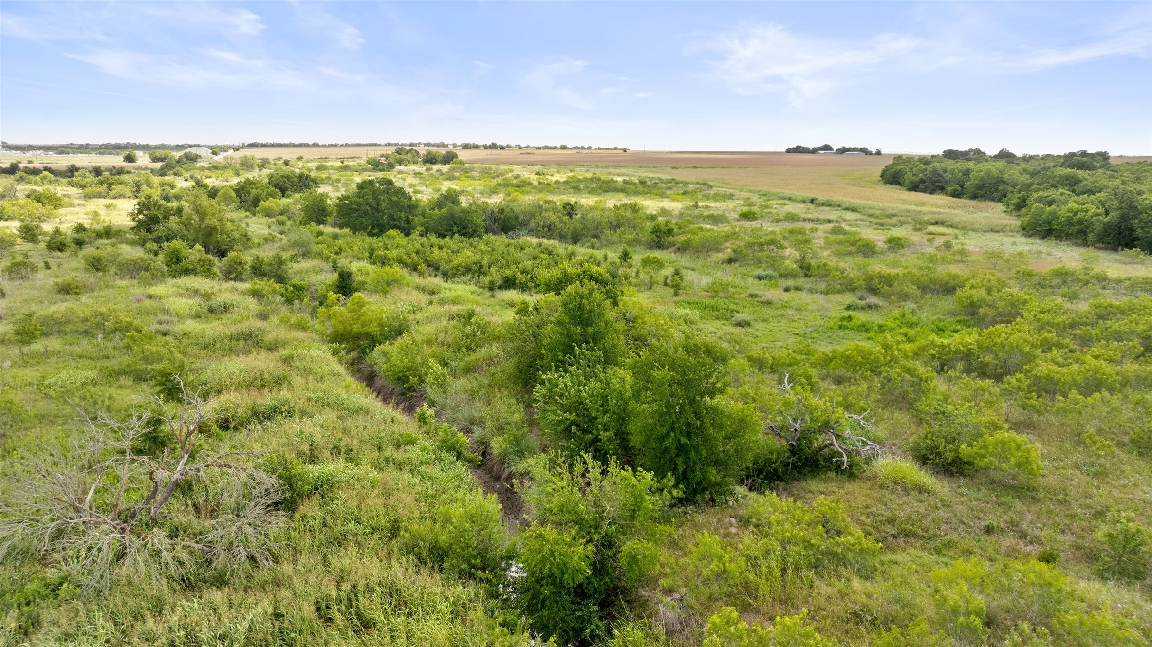 14101 Manda Road Manor, TX 78653 - Photo 8 of 16 a view of a field with an ocean