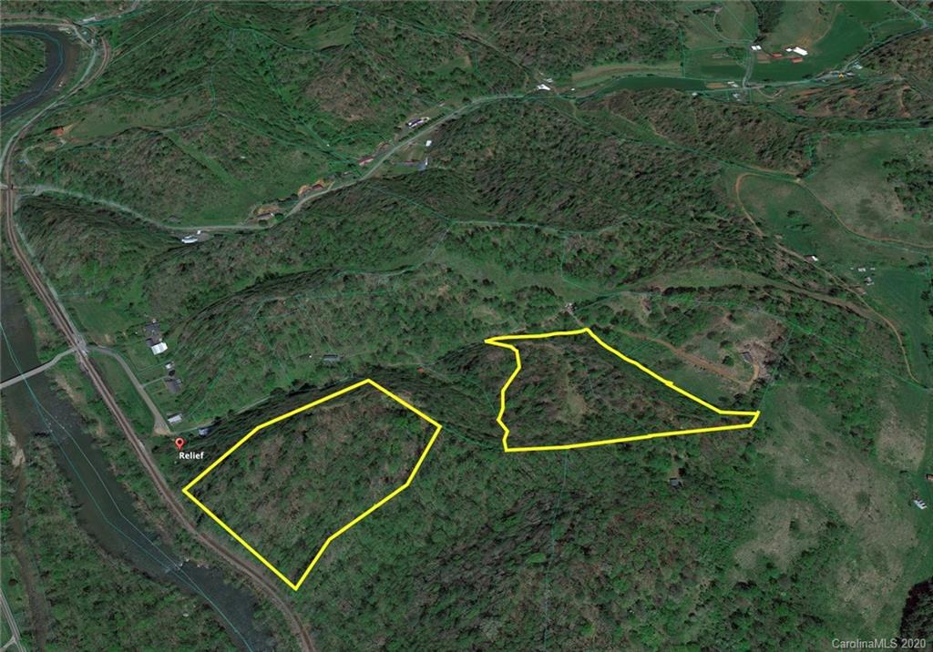 Tbd Relief Rd Extension, Unit 2 2A 3 6 7 Green Mountain, NC 28740 - Photo 1 of 1 an aerial view of a tennis court