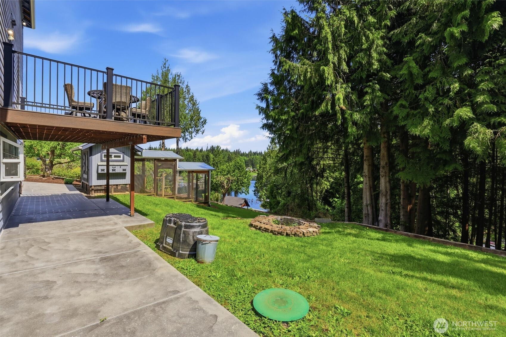 5523 East Wishon Road Snohomish, WA 98290 - Photo 38 of 39 a view of a house with backyard and sitting area