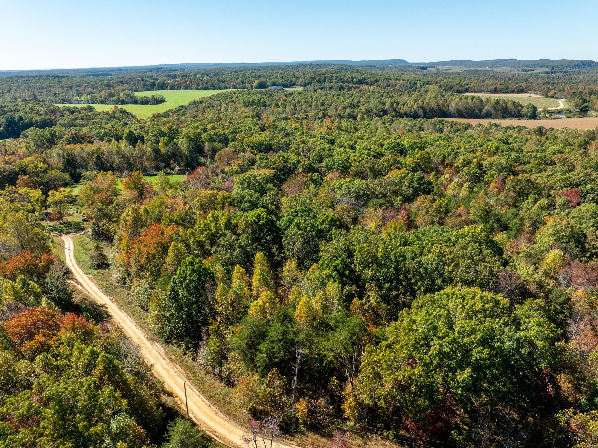0 Dickson Road Graysville, TN 37338 - Photo 10 of 11 an aerial view of residential houses with outdoor space and trees