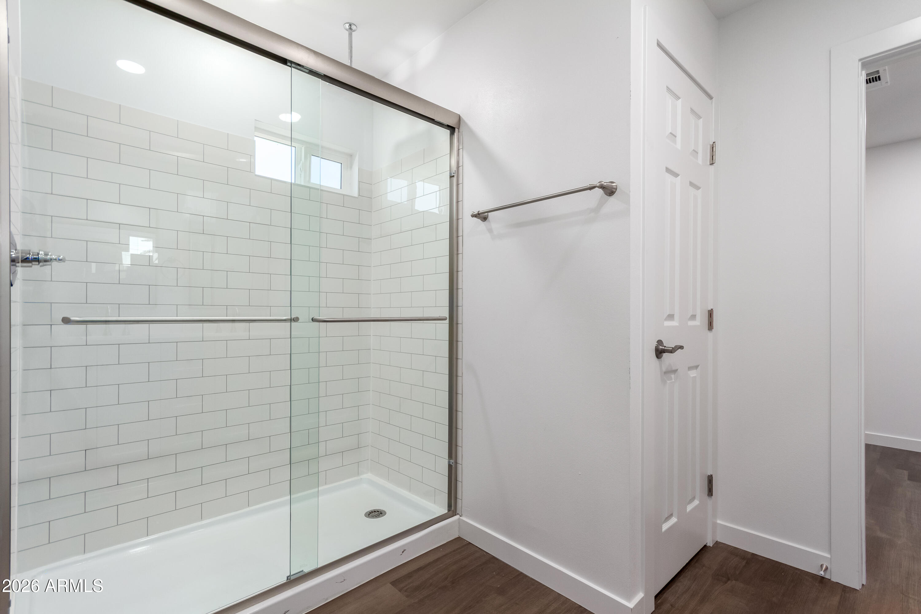 9155 West Adams Street Tolleson, AZ 85353 - Photo 17 of 29 a bathroom with a shower