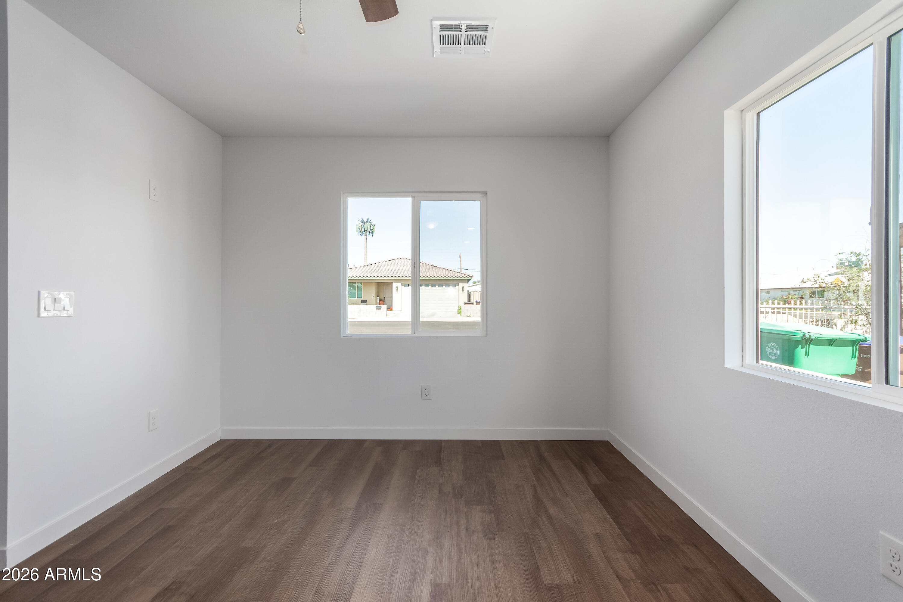 9155 West Adams Street Tolleson, AZ 85353 - Photo 22 of 29 an empty room with a window