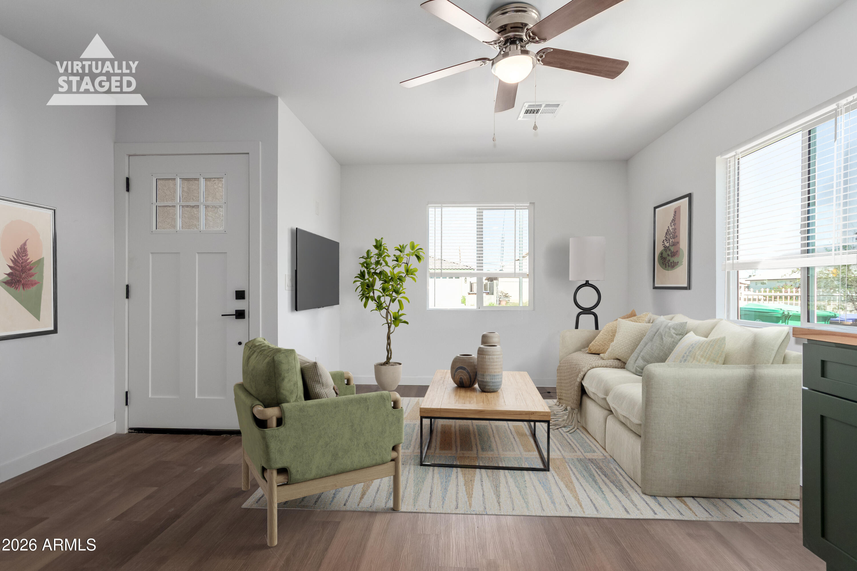 9155 West Adams Street Tolleson, AZ 85353 - Photo 29 of 29 a living room with furniture and a window
