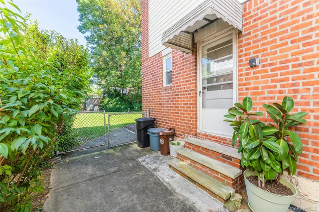 a house view with a garden space