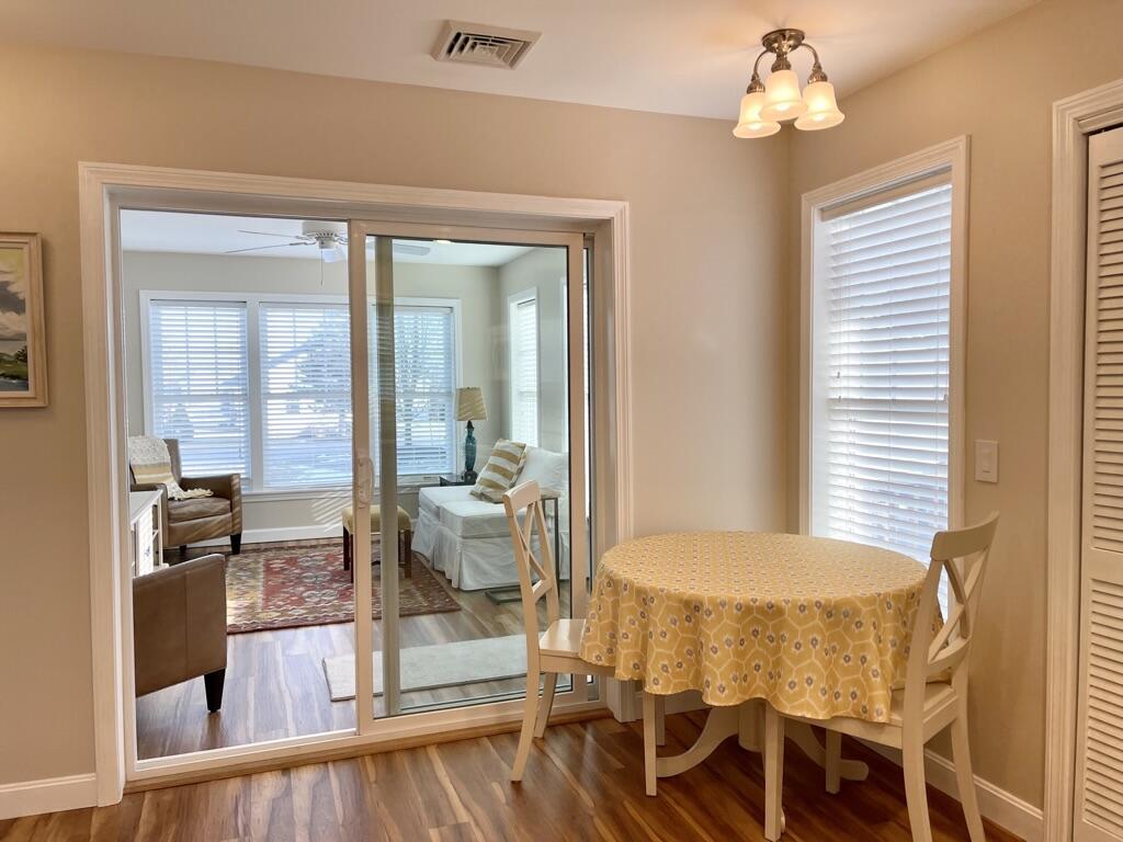 35 Barefoot Cottage Road, Unit 107 Wells, ME 04090 - Photo 5 of 25 5. Kitchen to Sunroom
