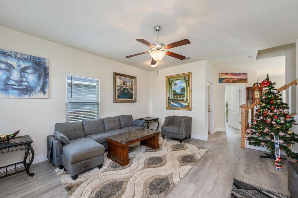 43 Brandywine Road Freeport, FL 32439 - Photo 2 of 23 a living room with furniture a window and a potted plant