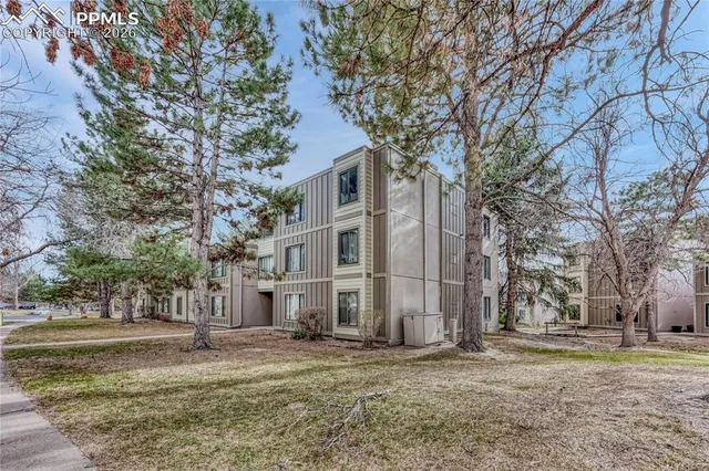 a view of entryway with wooden floor and stairs