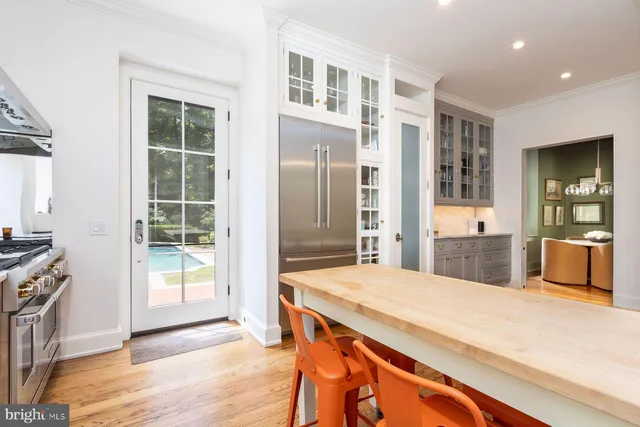 a bathroom with a sink a mirror and shower