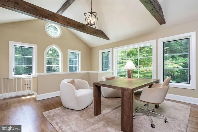 a view of bathroom with a window sink and toilet