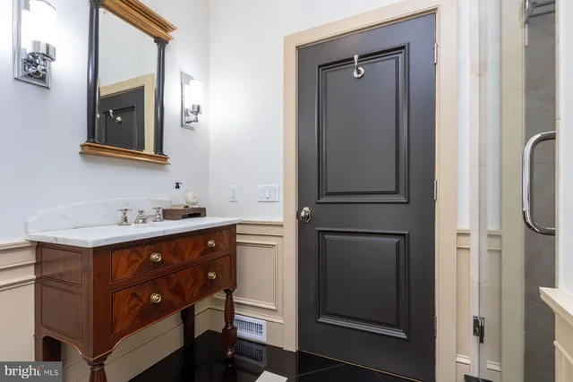 a aerial view of a house with swimming pool garden and patio