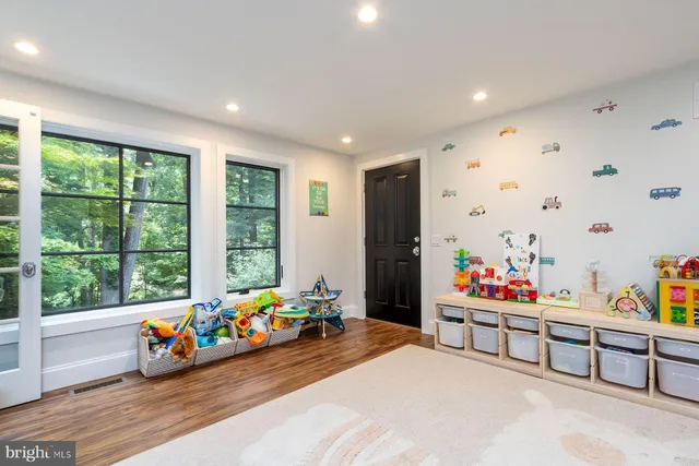 a view of yard with entertaining space and trees