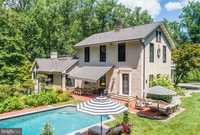 a picture of a bathroom with a sink and a shower