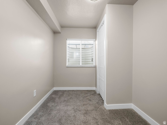 392 West Bricker Road Draper, UT 84020 - Photo 16 of 33 Carpeted room with neutral wall paint and white trim