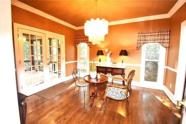 a white toilet sitting next to a bath tub shower