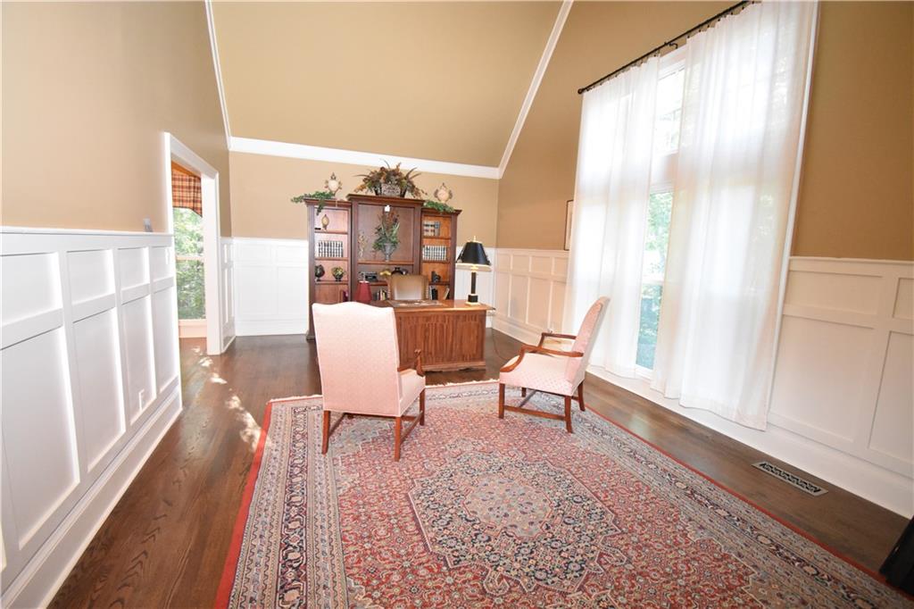 7700 Wickley Way Atlanta, GA 30350 - Photo 17 of 58 a dining room with furniture and wooden floor