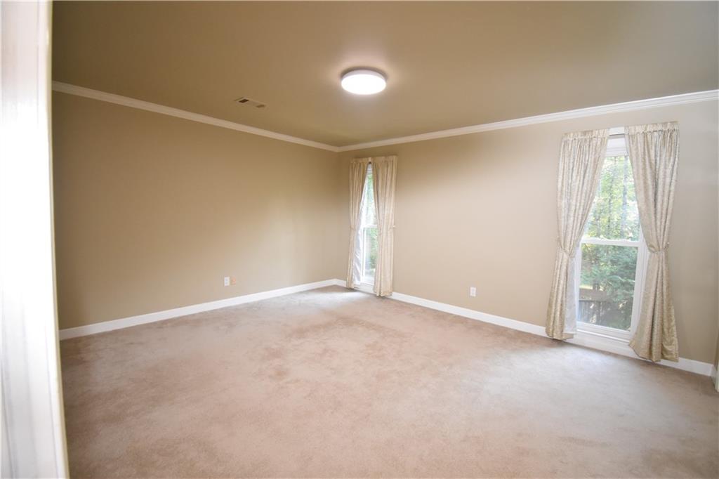 7700 Wickley Way Atlanta, GA 30350 - Photo 22 of 58 a view of an empty room with a window