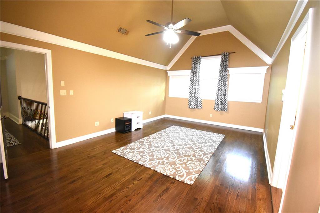 7700 Wickley Way Atlanta, GA 30350 - Photo 28 of 58 a view of an empty room window and wooden floor