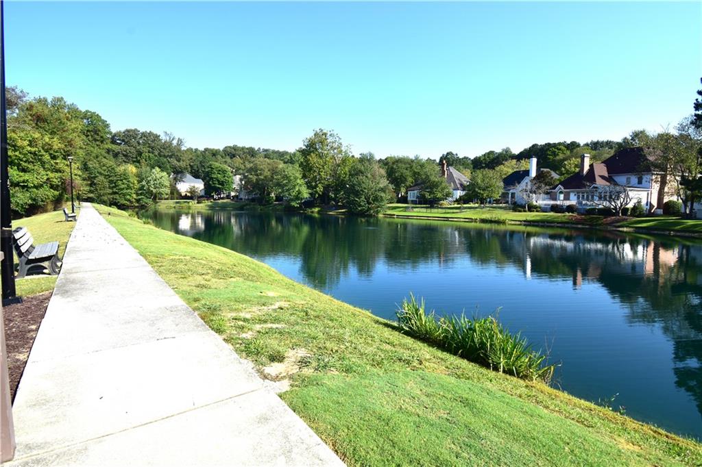 7700 Wickley Way Atlanta, GA 30350 - Photo 55 of 58 a view of a lake with a large trees