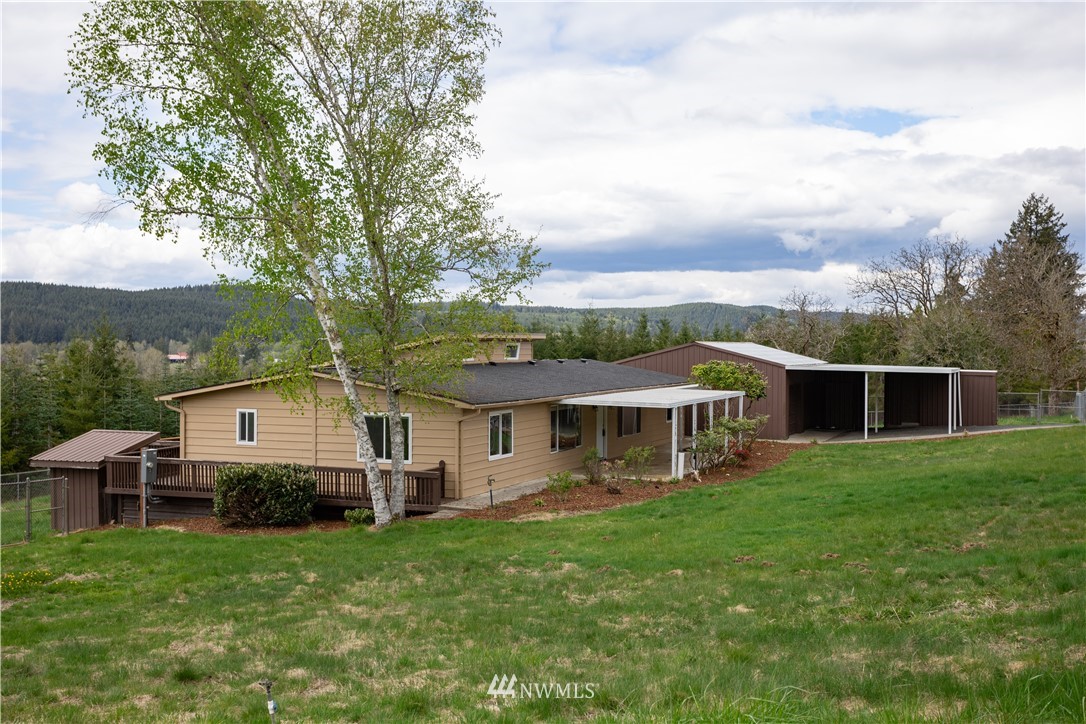 187 Senn Road Chehalis, WA 98532 - Photo 1 of 25 a view of a house with a backyard