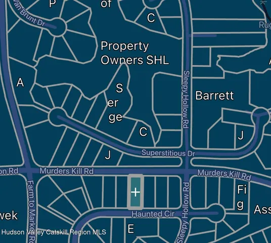 a view of a garden with a building