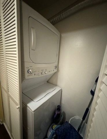 1802 Plum Grove Road, Unit 1D Rolling Meadows, IL 60008 - Photo 11 of 14 a utility room with dryer and washer