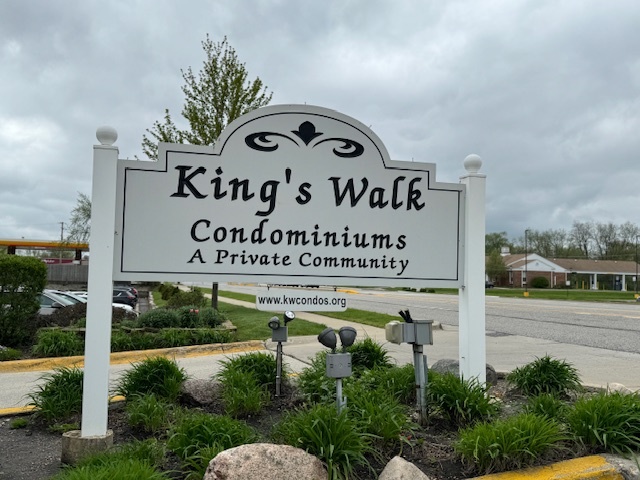1802 Plum Grove Road, Unit 1D Rolling Meadows, IL 60008 - Photo 14 of 14 a sign on the side of a building