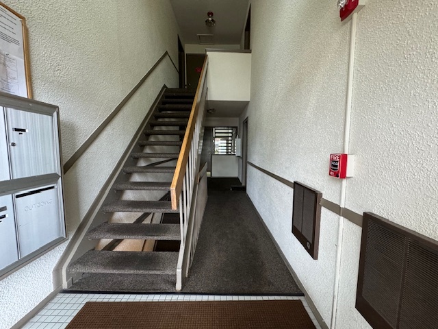 1802 Plum Grove Road, Unit 1D Rolling Meadows, IL 60008 - Photo 2 of 14 a view of entryway and hall with wooden floor