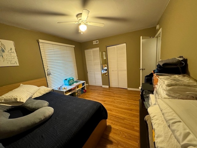 1802 Plum Grove Road, Unit 1D Rolling Meadows, IL 60008 - Photo 8 of 14 a bedroom with a bed and window