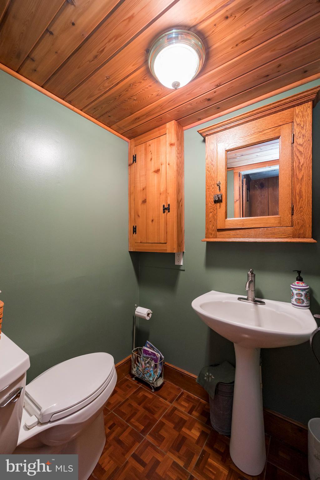 302 Landenberg Road Landenberg, PA 19350 - Photo 10 of 58 a bathroom with a sink mirror and toilet