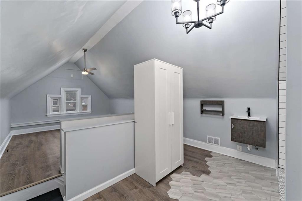 2002 Hampton Street Pittsburgh, PA 15218 - Photo 17 of 21 a view of a kitchen with refrigerator and microwave