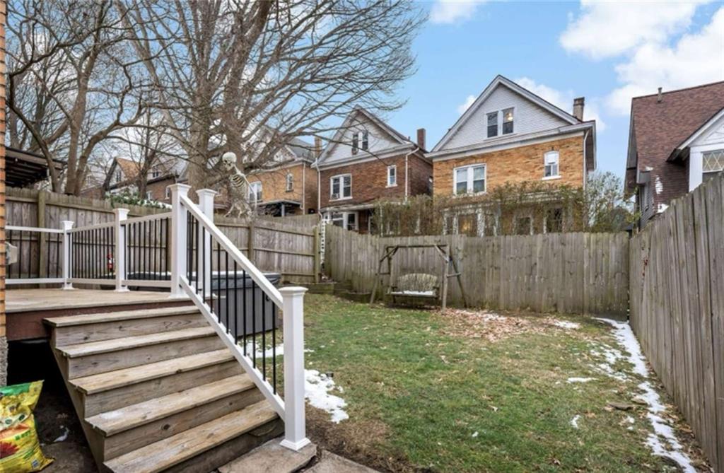 2002 Hampton Street Pittsburgh, PA 15218 - Photo 20 of 21 a front view of a house with a yard