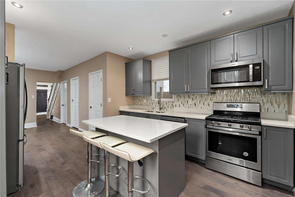 2002 Hampton Street Pittsburgh, PA 15218 - Photo 8 of 21 a kitchen with cabinets appliances and a sink